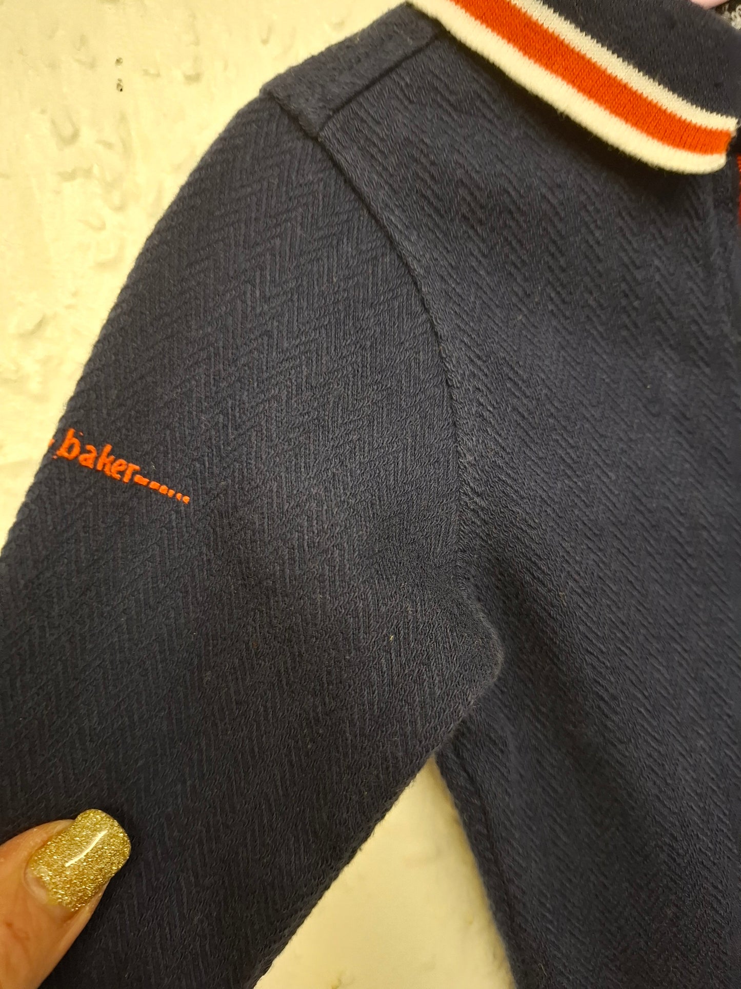 0-3 months: Ted Baker Thick Woven Cotton Bodysuit