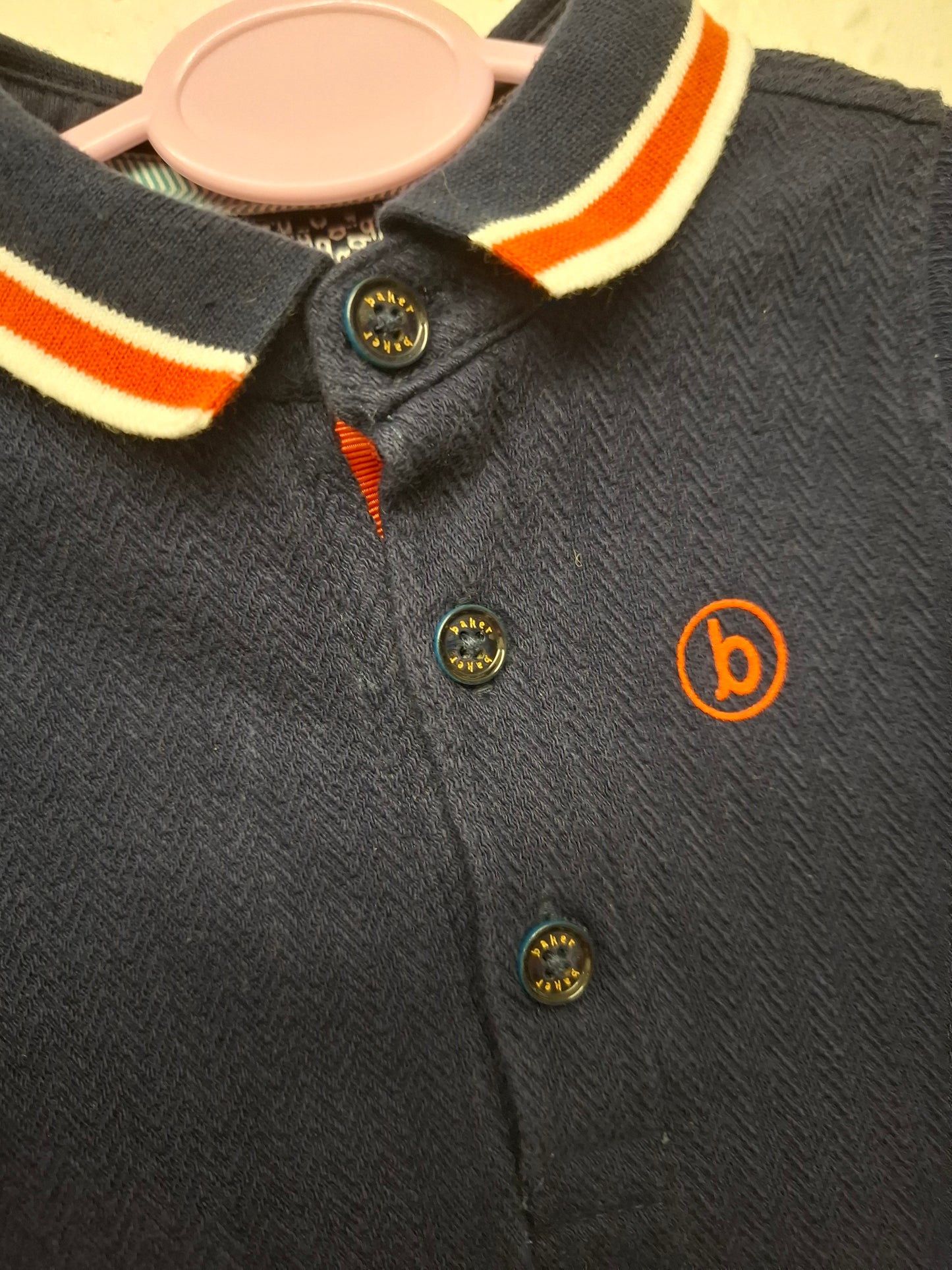 0-3 months: Ted Baker Thick Woven Cotton Bodysuit