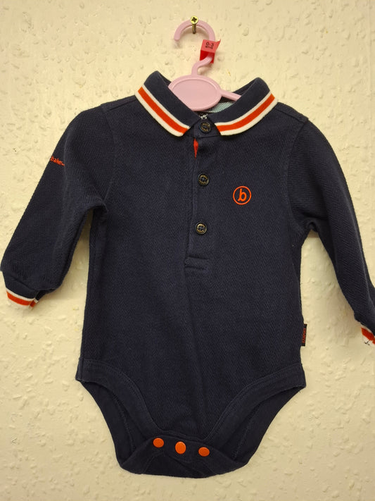 0-3 months: Ted Baker Thick Woven Cotton Bodysuit